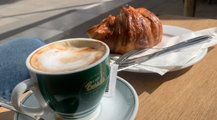A sunny morning in Italy with a hot beverage