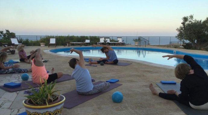 Pilates for beginners class in a beautiful Italian villa by the pool