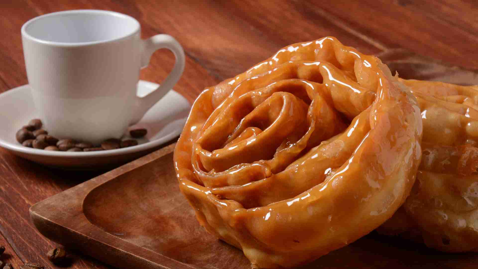 Chebakia is a deep-fried cookie, soaked in honey & sprinkled with sesame seeds. Chebakia is a deep-fried cookie, soaked in honey & sprinkled with sesame seeds.