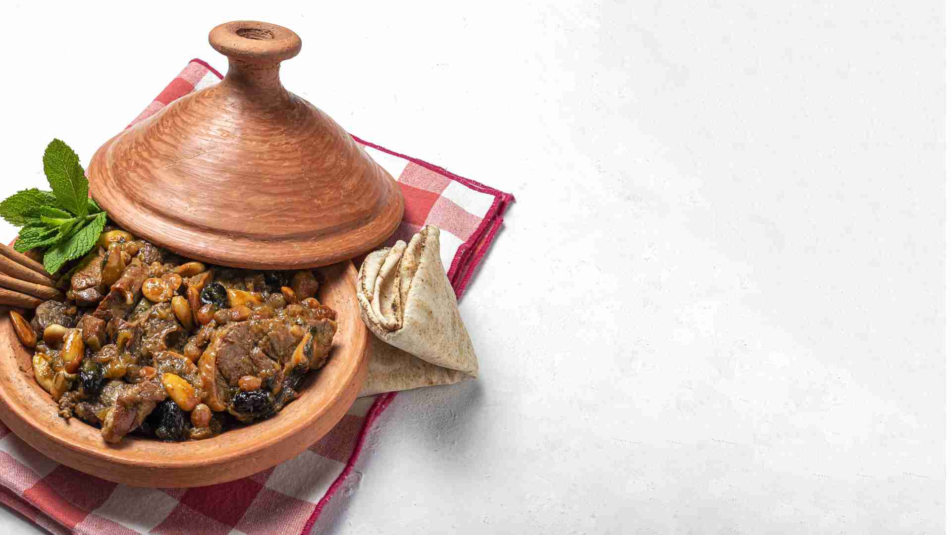 Delicious slow-cooked lamb tangia flavoured with aromatic spices. Delicious slow-cooked lamb tangia flavoured with aromatic spices.