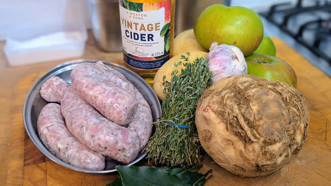 Your ingredients to make cider-braised sausages with creamy celeriac mash.