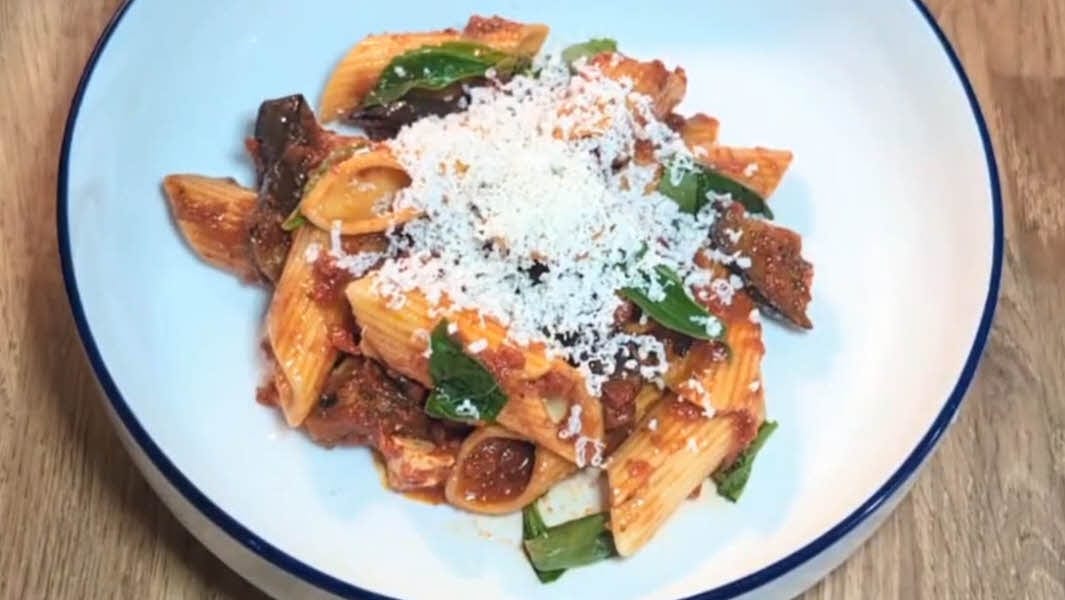 Pasta alla Norma with grated Ricotta Salata as the finishing touch.