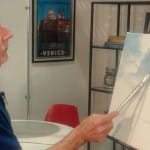 Painting a sky with acrylics.