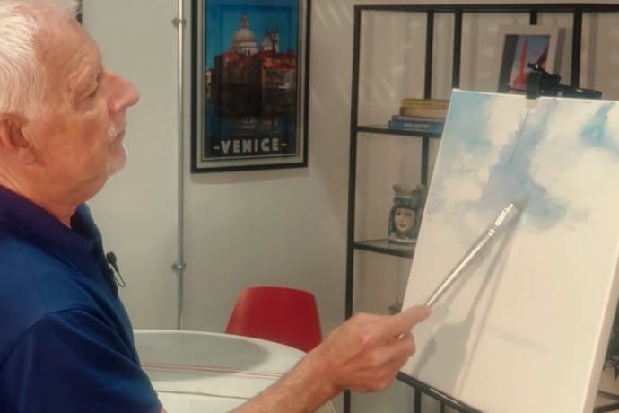 Painting a sky with acrylics.