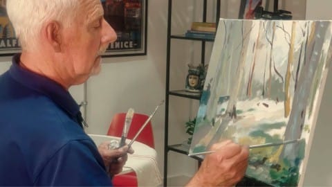 Art tutor Douglas Matthews showing techniques for painting trees with acrylics.