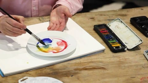 Watercolour paints for beginners and how to start colour mixing on the palette.