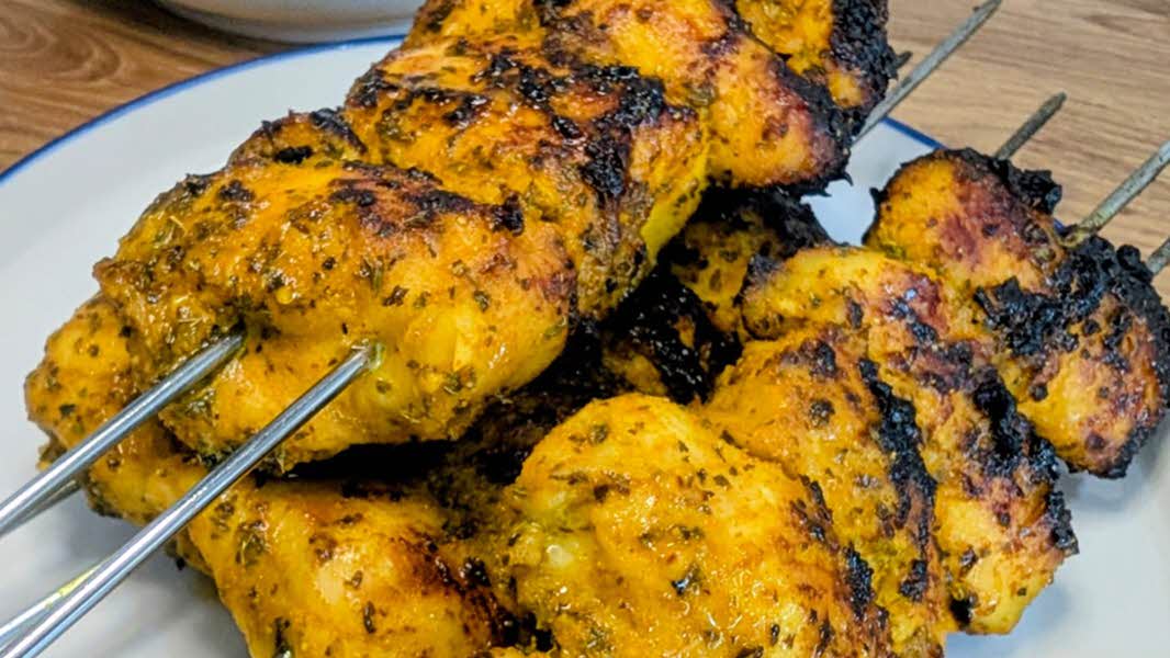 Moroccan sticky and orange and turmeric chicken skewers.
