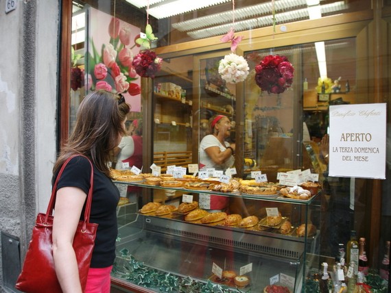Single traveller looking at delicious Italian food