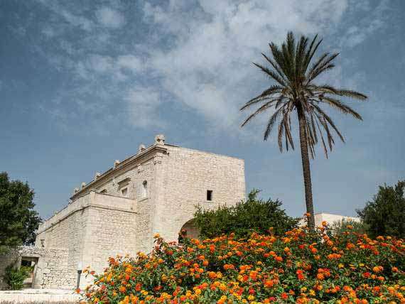 The stylish exterior of our venue in Sicily. The stylish exterior of our venue in Sicily, with stone walls.