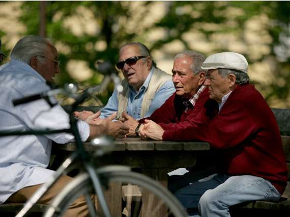 Men-Sitting-on-Bench Men-Sitting-on-Bench