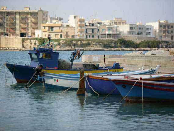 Idyllic harbour in Puglia with boats. Idyllic harbour in Puglia with boats.